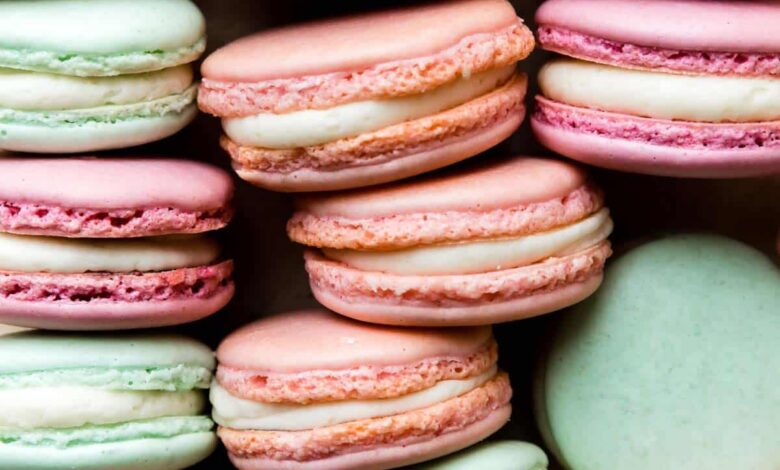 pink, purple, and aqua blue French macarons